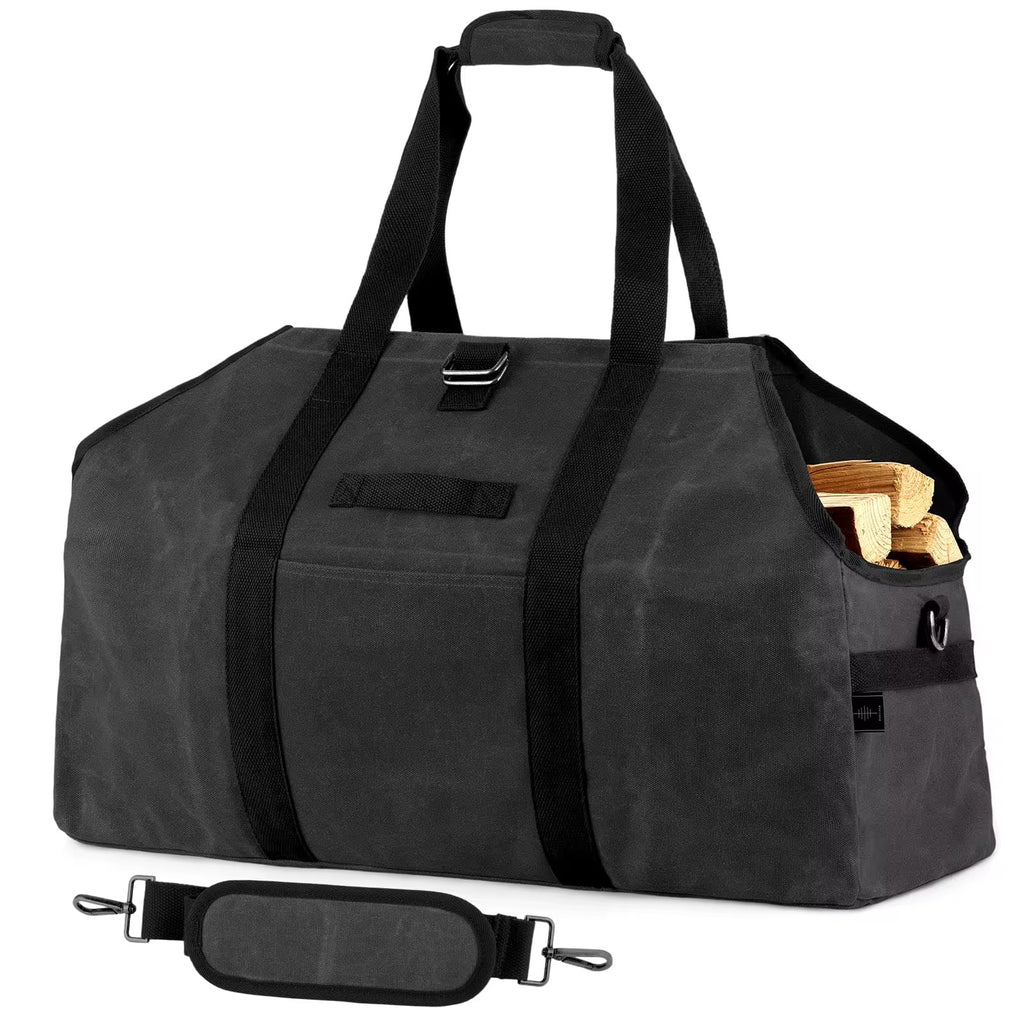 Black waxed canvas firewood bag with shoulder strap and wooden logs inside on a white background.
