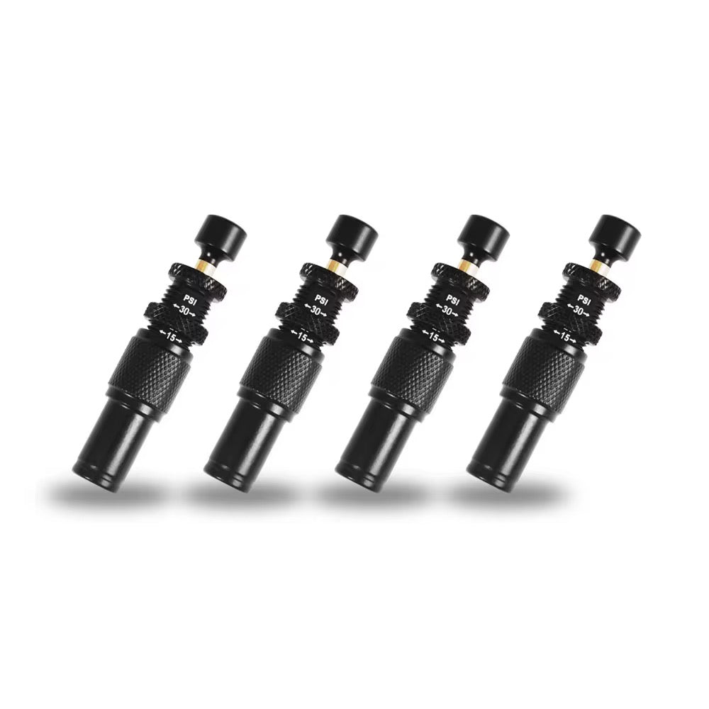 4 tyre pressure monitor gauges in a row on a white background